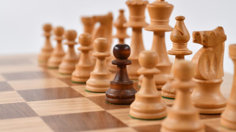 selective focus photography of chess pieces