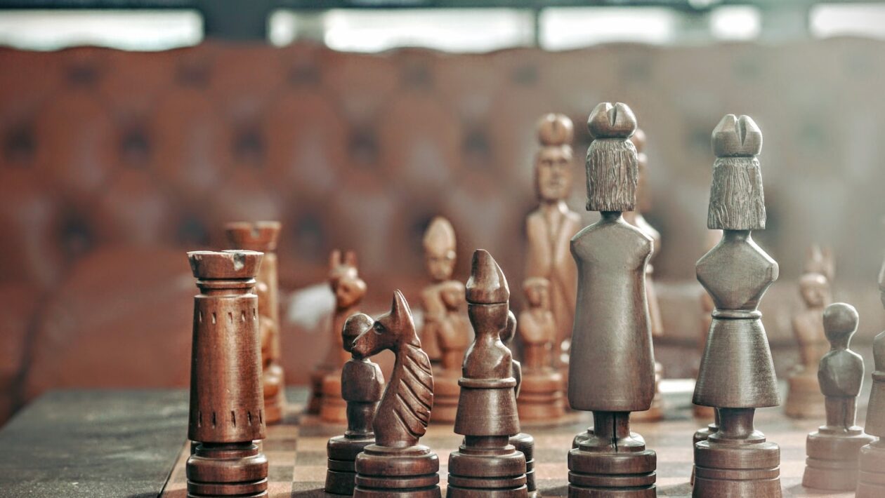 selective focus photography of chess pieces