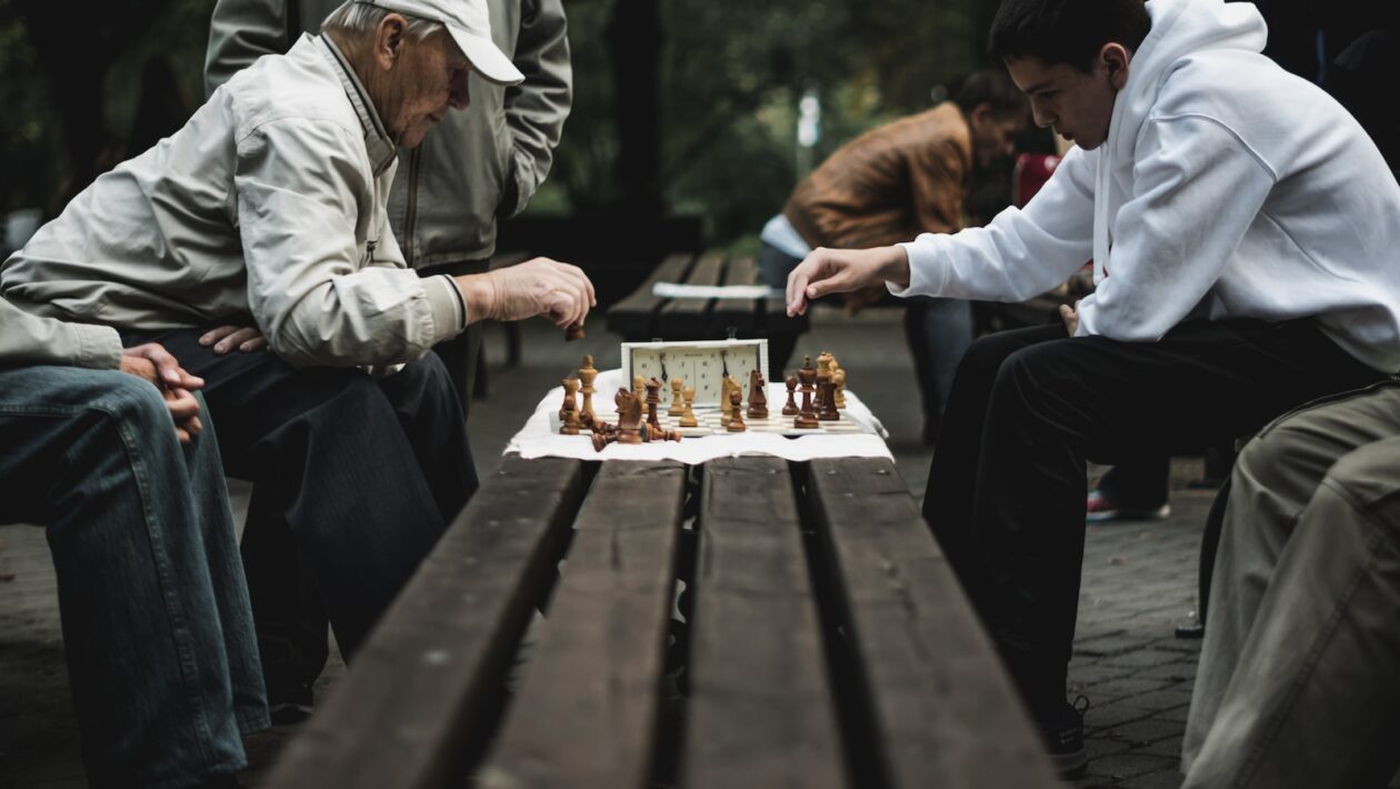 two men playing chess board game
